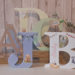 Winnie the Pooh personalised capital letter plaque. Alphabet sign with name.